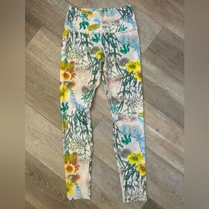 Playground leggings. Ladies size medium, never worn.